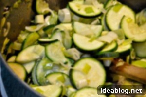 Vibrant Green Lima Bean, Zucchini, and Spinach Soup 8 Soup simmering in a pot