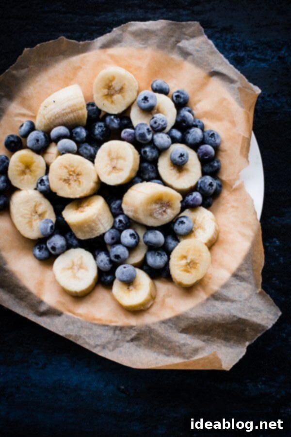 Simple Berry Smoothie - made with greek yogurt, frozen berries, coconut water, and my favorite smoothie addition: almond buttter.  Simple Berry Smoothie - a healthy blend of frozen berries, Greek yogurt, coconut water, and almond butter, perfect for a refreshing meal or snack.