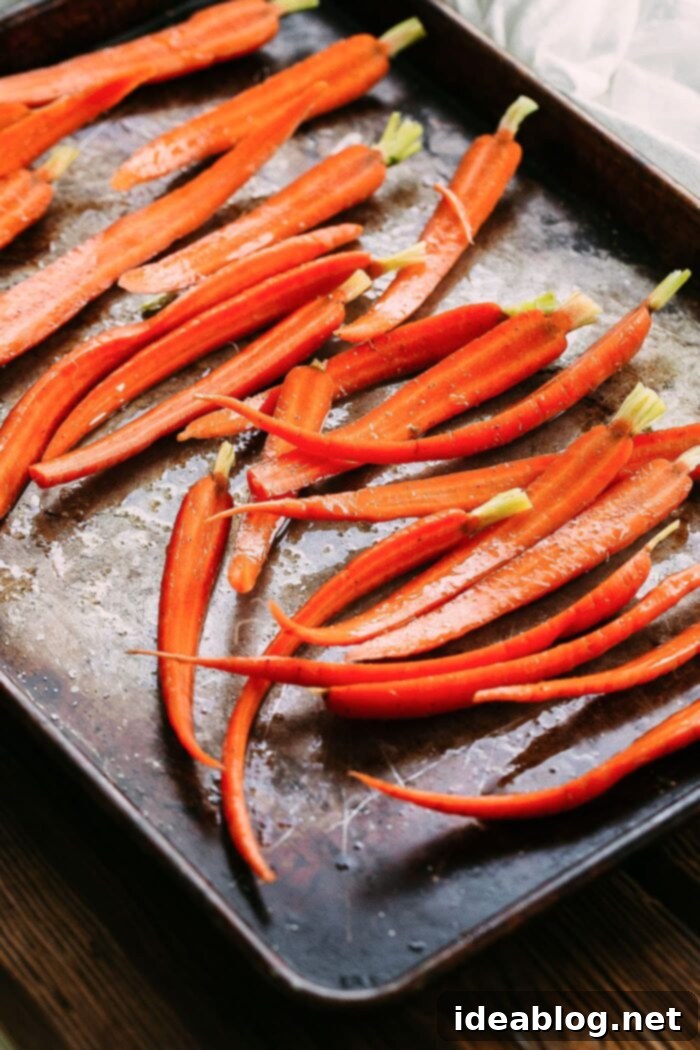 Root to Leaf Roasted Carrots with Vibrant Carrot Top Pesto 5 Roasted Carrots on Sheet Pan
