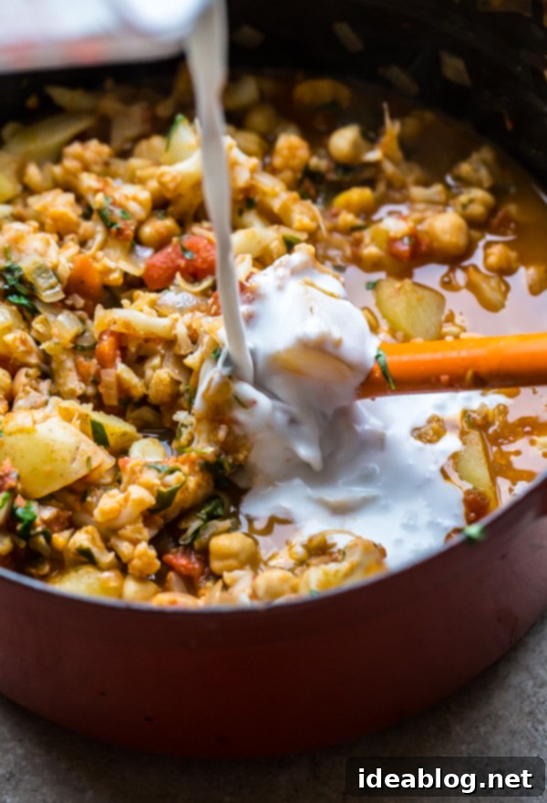 My Top 12 Wholesome Winter Warmers 3 Healthy Winter Recipe: Cauliflower Chickpea Curry with vibrant spices and fresh cilantro