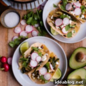 Zesty Salsa Verde Chicken Tacos 4 Salsa Verde Chicken Tacos. These easy chicken tacos are made with braised chicken thighs, poblano peppers, onions, and roasted tomatillo salsa!