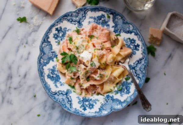 Homemade Pappardelle Pasta - a simple traditional egg pasta dough recipe made with all-purpose flour, semolina, and eggs! Made traditionally or naturally colored (pink!) with beet puree. #pasta #recipe #pappardelle #homemade #italian #abeautifulplate Homemade Pappardelle Pasta