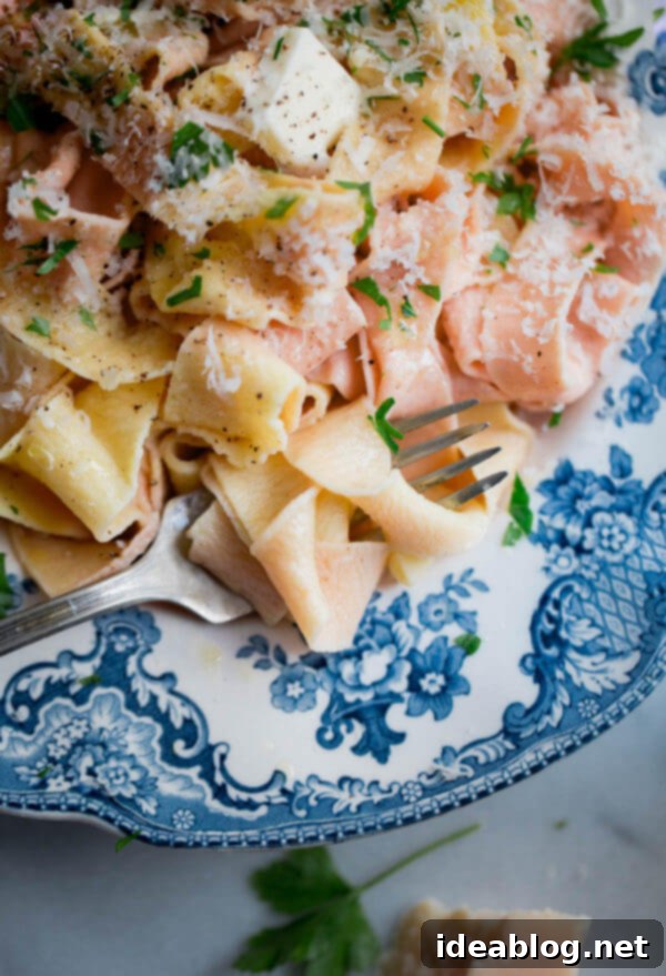Homemade Pappardelle Pasta - a simple traditional egg pasta dough recipe made with all-purpose flour, semolina, and eggs! Made traditionally or naturally colored (pink!) with beet puree. #pasta #recipe #pappardelle #homemade #italian #abeautifulplate Homemade Pappardelle Pasta