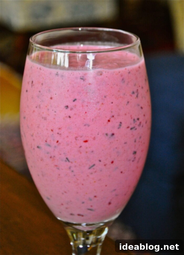 Sun-Kissed Berry Peach Smoothie 3 Close-up of Summertime Berry Peach Smoothie ingredients and preparation