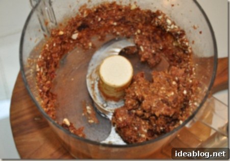 Cherry Pie Energy Bites 4 Mixing ingredients for Copycat Cherry Pie Larabars in a food processor