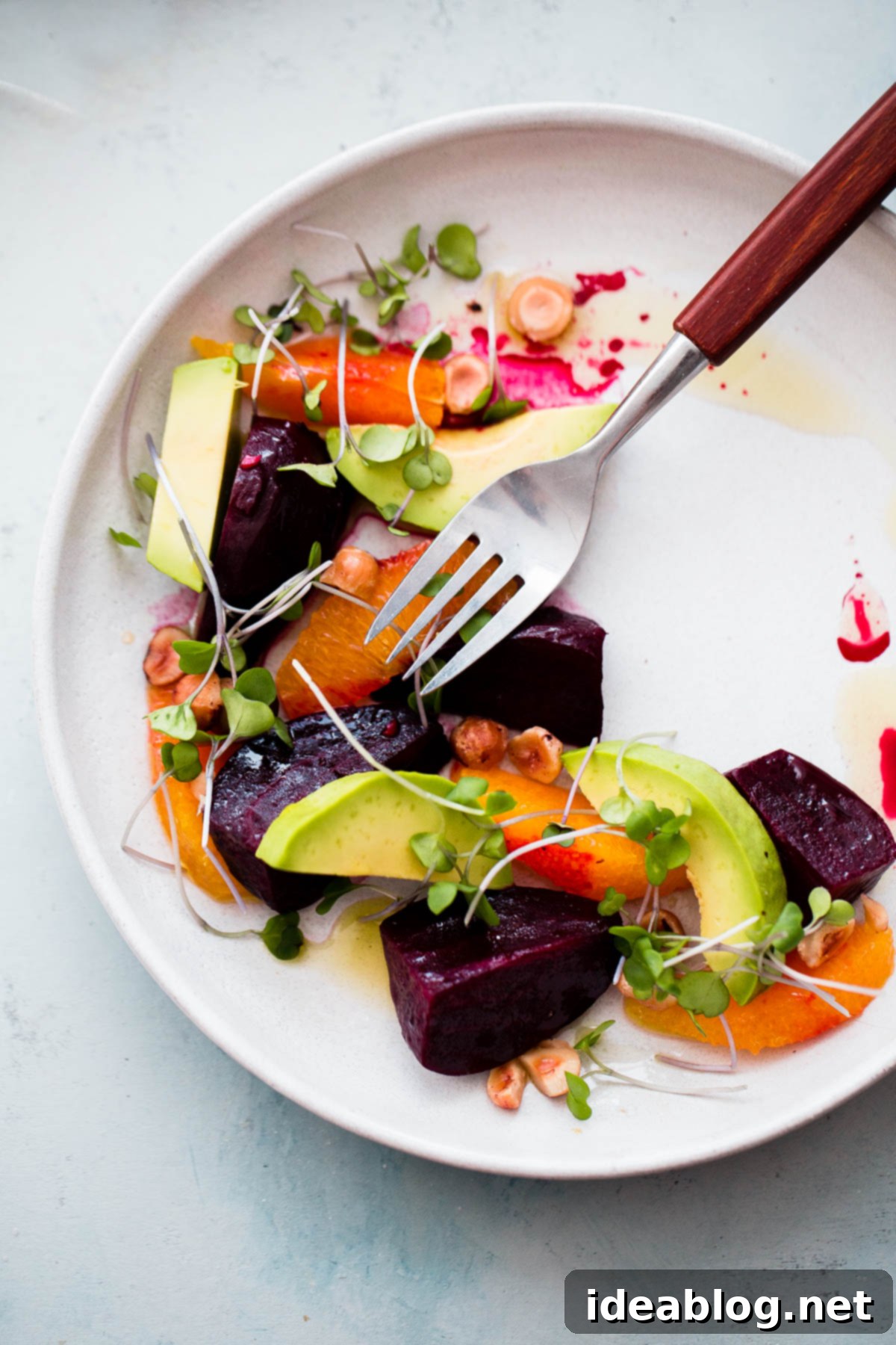 Roasted Beet Salad with Orange and Avocado. An EASY healthy salad recipe packed with healthy fats, texture, and nutrition! Roasted Beet Salad with Citrus and Avocado, ready to serve