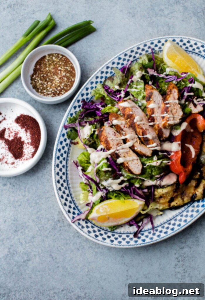 Zesty Mediterranean Chicken Salad with Sumac 59 AMAZING Mediterranean Chicken Salad with Sumac Dressing. This salad is packed with flavor and is topped with tahini dressing!