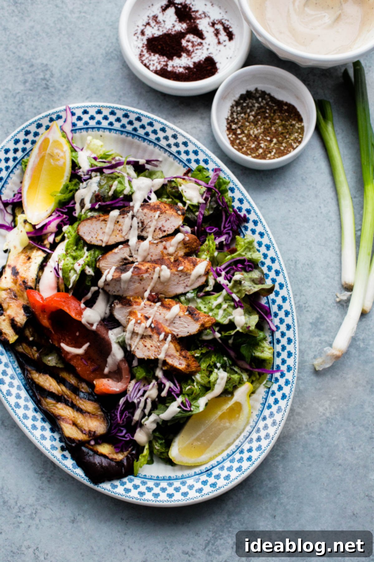 Zesty Mediterranean Chicken Salad with Sumac 7 AMAZING Mediterranean Chicken Salad with Sumac Dressing. This salad is packed with flavor and is topped with tahini dressing!