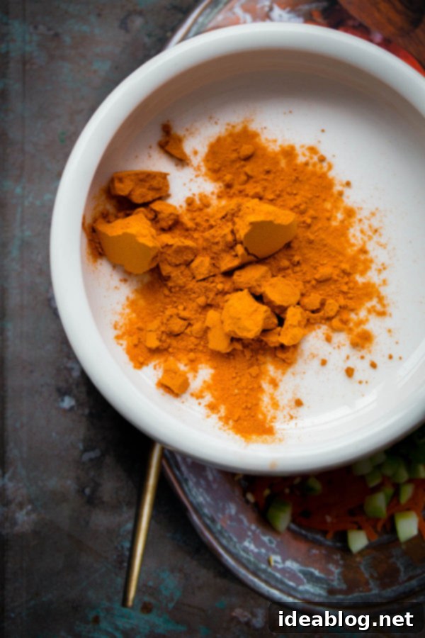 Golden Almond Elixir 2 Turmeric Almond Milk - a lightly sweetened warm drink made from turmeric, almonds, and milk and infused with saffron and cardamom!