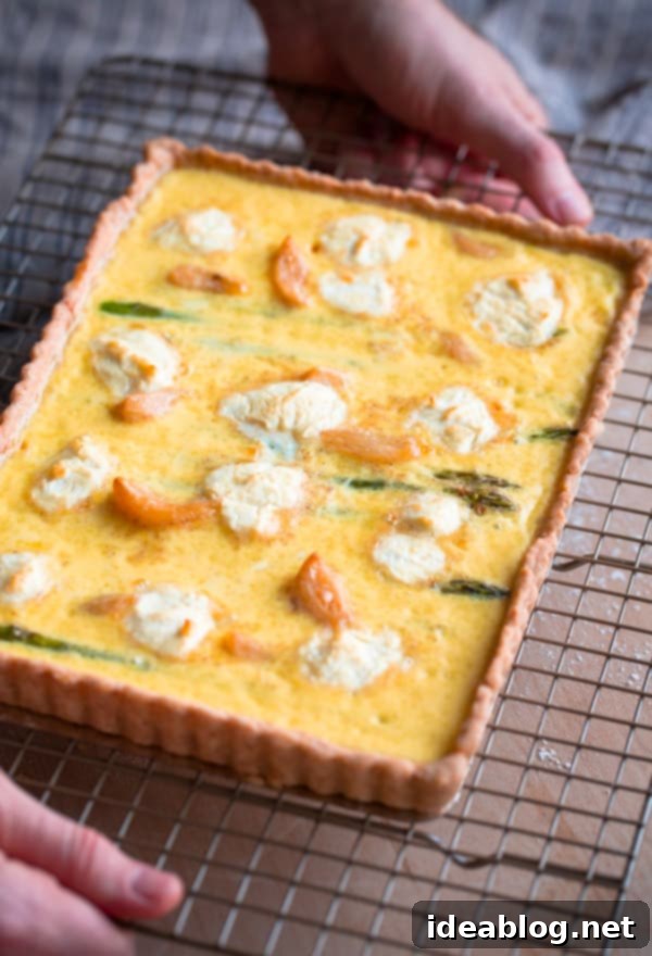 18 Scrumptious Brunch Recipes to Make Mom Smile 13 Elegant Asparagus Goat Cheese Quiche with a golden, flaky crust