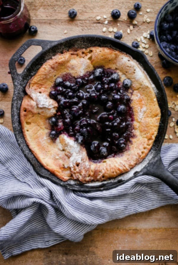 18 Scrumptious Brunch Recipes to Make Mom Smile 5 Gluten-Free Dutch Baby pancake topped with fresh blueberries and maple syrup