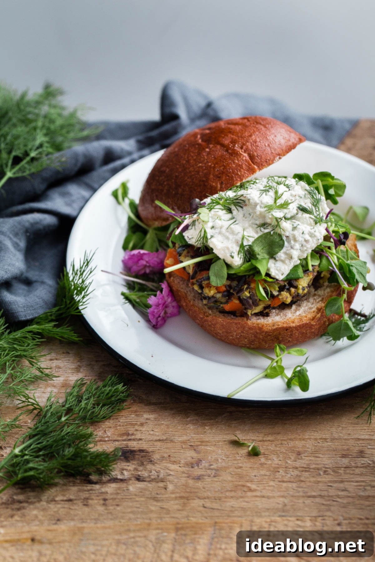 Savory Wild Rice Burgers with Creamy Herb Ricotta 2 Delicious Wild Rice Veggie Burgers with Herbed Ricotta – a wholesome, hearty vegan veggie burger recipe packed with wild rice and fresh vegetables!