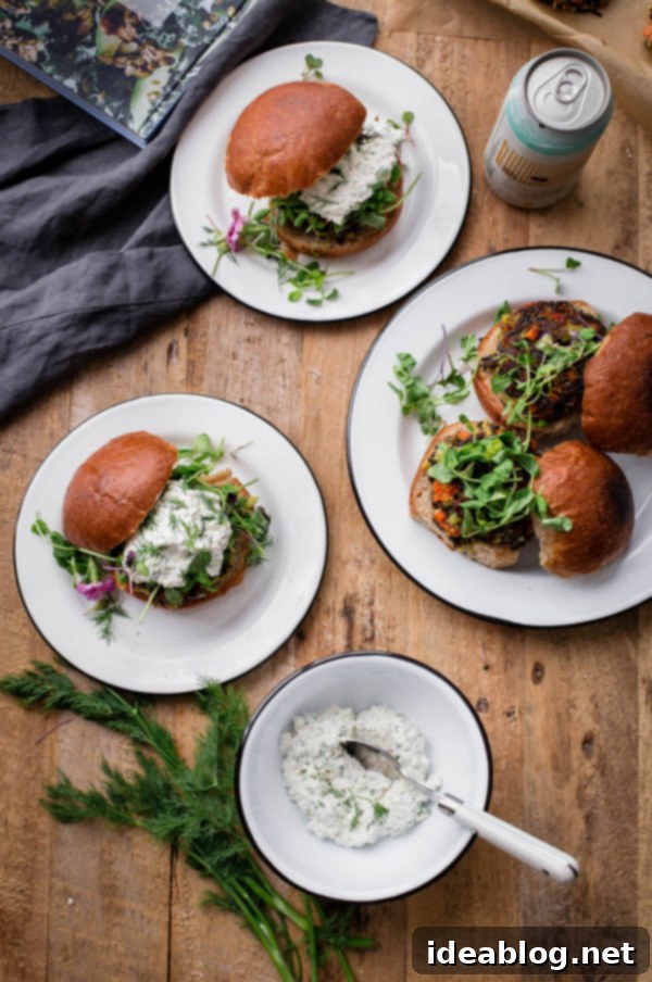 Savory Wild Rice Burgers with Creamy Herb Ricotta 4 Two Wild Rice Veggie Burgers stacked, topped with creamy herbed ricotta and fresh greens.