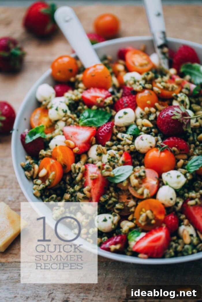 Easy Breezy Summer Meals 2 Strawberry Caprese Farro Salad - A delightful and hearty summer salad featuring fresh strawberries, basil, tomatoes, and mozzarella with farro.