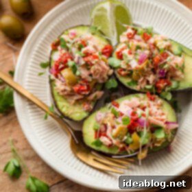 Avocado Tuna Pockets 8 Italian Tuna Avocado Boats - fresh tuna salad made with Bella Portofino extra virgin olive oil packed yellowfin tuna, olives, sundried tomatoes, parsley, and lime served in avocado boats. An easy, healthy, dairy free, gluten free, and paleo friendly recipe!