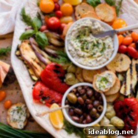 Tuna Crostini & Italian Antipasto Medley 6 Tuna Crostini with Italian Antipasto - crisp baguette slices topped with an EASY, herbaceous tuna spread made with Bella Portofino extra virgin olive oil packed Albacore tuna, mascarpone, capers, lemon zest, and fresh herbs!