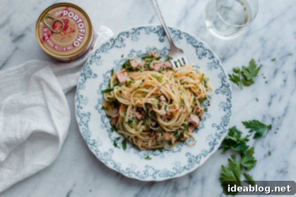 Tuna Pasta with Capers and Parsley - a fresh and EASY weeknight pasta recipe made with canned tuna! #pasta #recipe #abeautifulplate #italianrecipes #tunafish Tuna Pasta