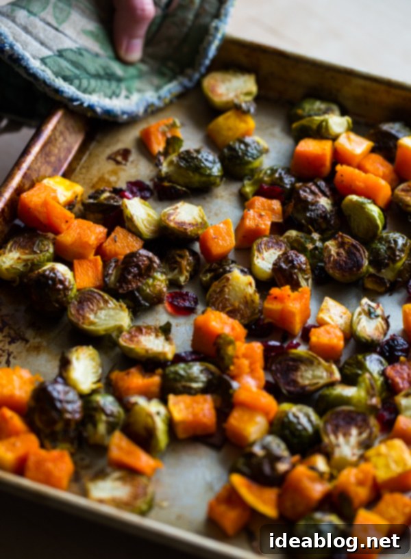 Cozy Fall Cooking: 10 Delightful Recipes 8 Roasted Brussels Sprouts and Butternut Squash with Dried Cranberries and Dijon Vinaigrette