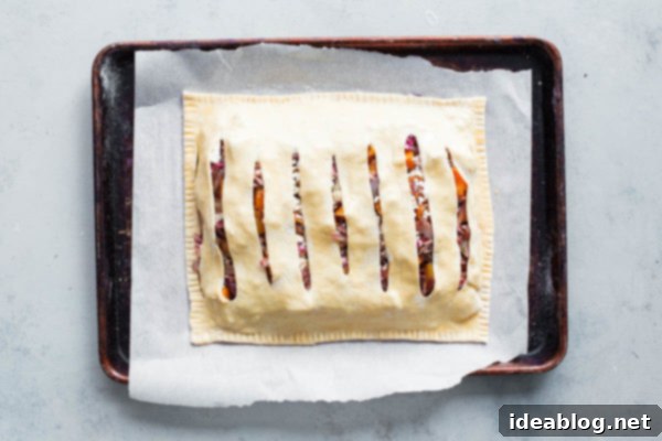 Sweet & Savory Butternut Radicchio Feta Tart 12 Carefully placing the lattice puff pastry top on the savory pie