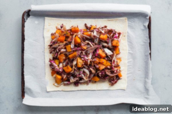 Sweet & Savory Butternut Radicchio Feta Tart 9 First step in assembling Butternut Squash Pie: spreading the filling on puff pastry