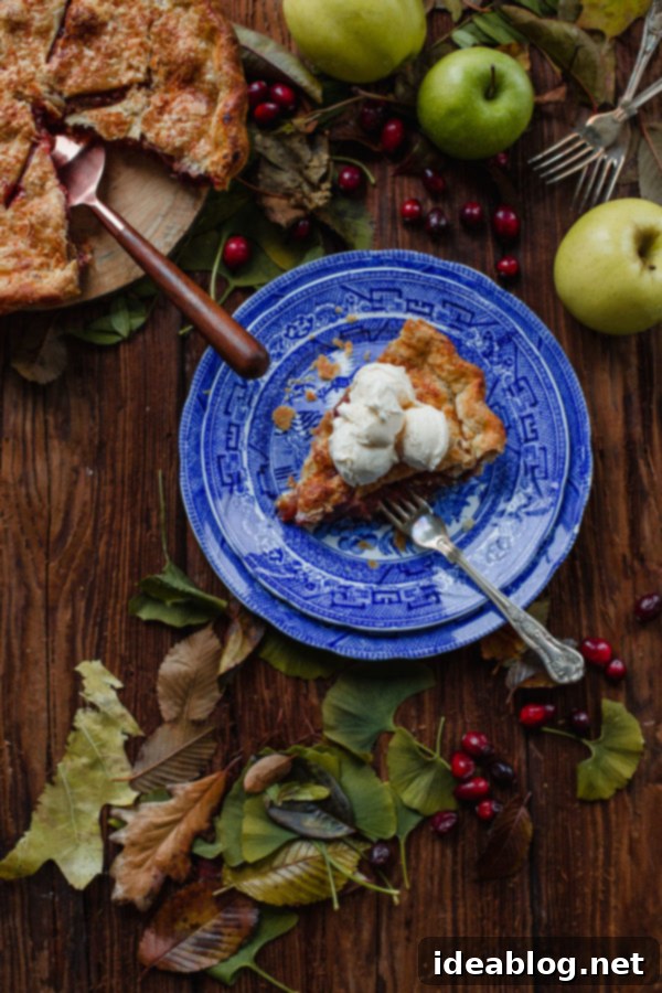 Autumn's Apple Cranberry Delight 12 Apple Cranberry Pie - fresh cranberries and orange zest add a tart zip to this Apple Cranberry Pie, which is packed with apples, and prepared with an all-butter, flaky pie crust.