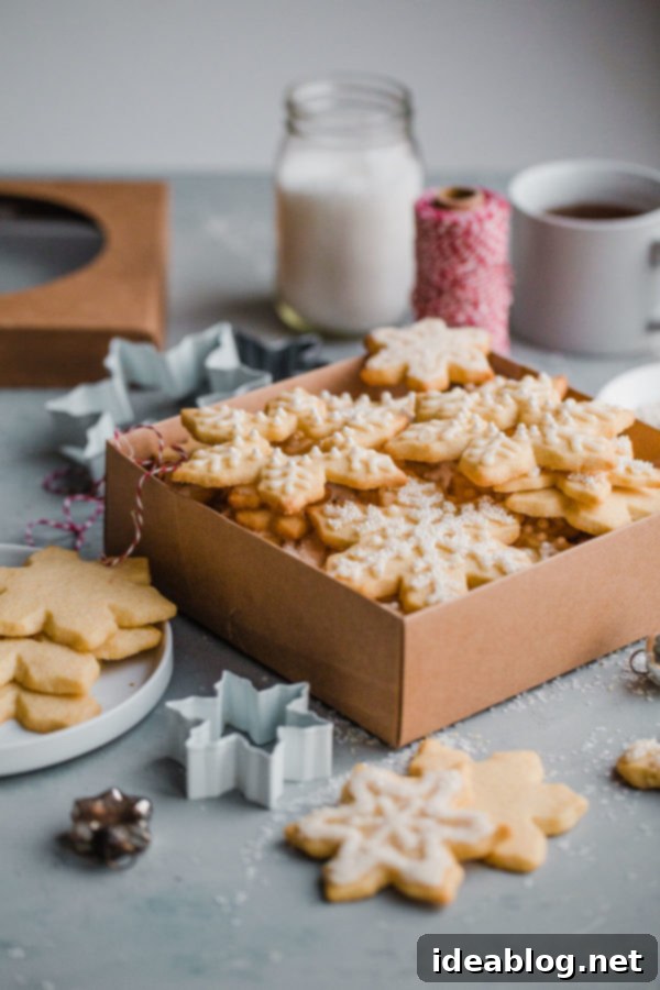 Tender Almond Sugar Cookies with Sweet Glaze 3 Almond Sugar Cookies - EASY and delicious cut out sugar cookie recipe made with almond meal and flavored with almond extract, vanilla, and orange zest.