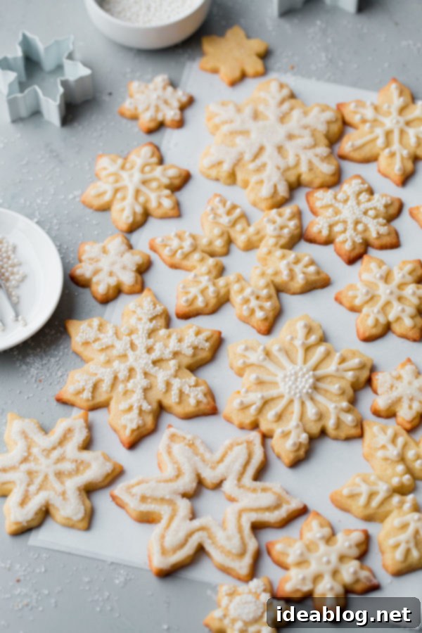 Tender Almond Sugar Cookies with Sweet Glaze 5 Almond Sugar Cookies - delicious crisp, tender, and buttery sugar cookies made with almond meal and flavored with almond extract and fresh orange zest. Topped with a simple cookie icing!