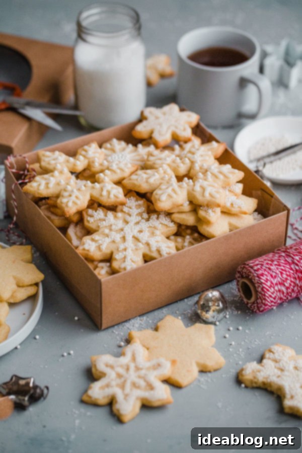 Tender Almond Sugar Cookies with Sweet Glaze 9 Almond Sugar Cookies - delicious crisp, tender, and buttery sugar cookies made with almond meal and flavored with almond extract and fresh orange zest. Topped with a simple cookie icing!