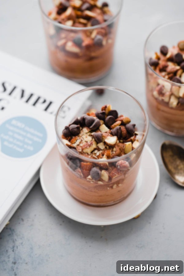 Simple and Delicious Two-Ingredient Chocolate Mousse Easy Chocolate Mousse in a serving cup, showing its smooth and airy texture.