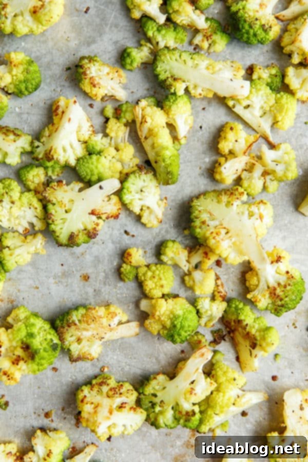 Romanesco Rhapsody Pasta 5 Roasted Romanesco Florets on a baking sheet, golden and caramelized.