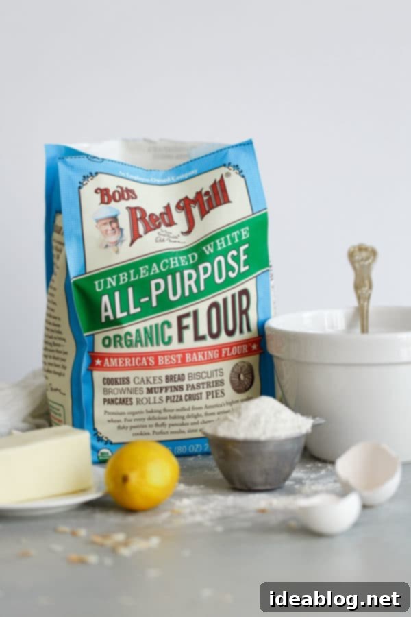 Essential Baking Ingredient: Bob's Red Mill Organic Unbleached All Purpose Flour, perfect for achieving the ideal texture in our Lemon Coconut Cake. #bakingflour #bobsredmill #organicbaking #allpurposeflour Bobs Red Mill Organic Unbleached All Purpose Flour