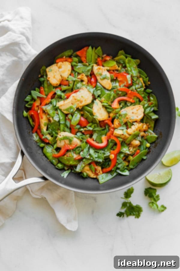 Easy Chicken Snow Pea Stir Fry - A vibrant chicken snow pea stir fry with bell peppers and an aromatic sauce, perfect for a 30-minute dinner. Easy Chicken Snow Pea Stir Fry