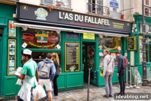 The Taste of Paris: Your Dining Companion 23 The bustling facade of L'as Du Fallafel in the Marais district.
