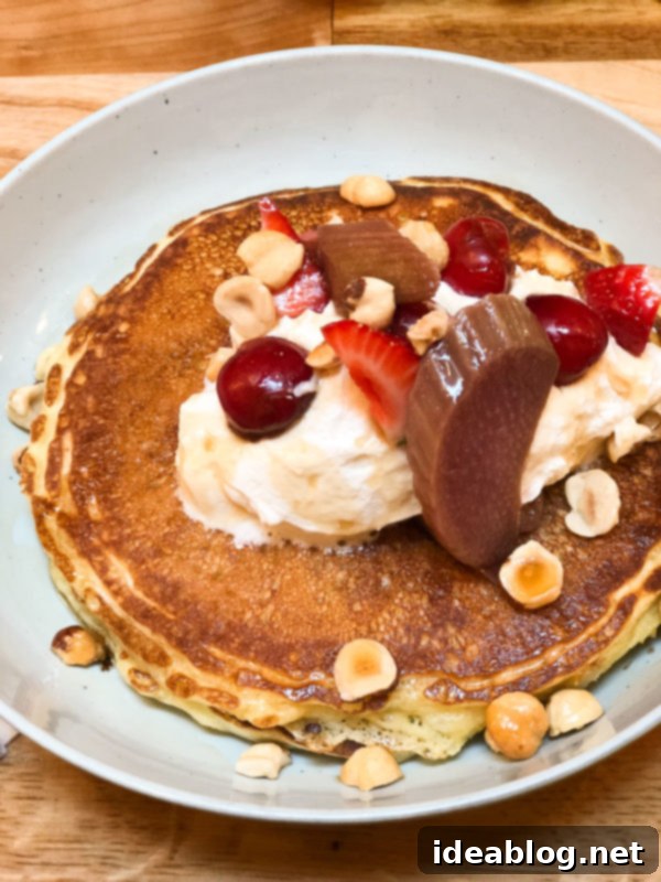 The Taste of Paris: Your Dining Companion 29 Delicious and fluffy pancakes with fruit from Holybelly Cafe.