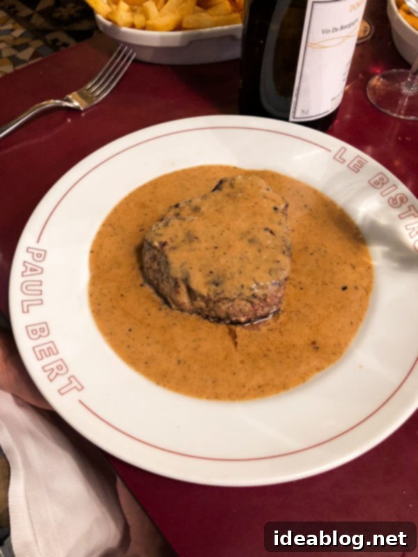 The Taste of Paris: Your Dining Companion 35 A beautifully presented steak au poivre dish from Bistrot Paul Bert.