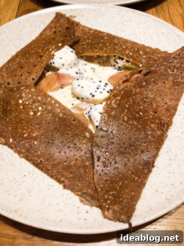 The Taste of Paris: Your Dining Companion 37 A savory buckwheat crepe with classic Parisian fillings from Breizh Cafe.