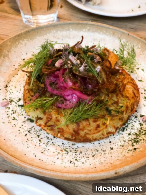 The Taste of Paris: Your Dining Companion 38 A vibrant, artfully plated small dish from Au Passage restaurant.