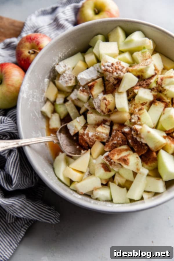 Rustic Apple Hazelnut Crumble 3 Apple Crisp Filling ingredients in a mixing bowl