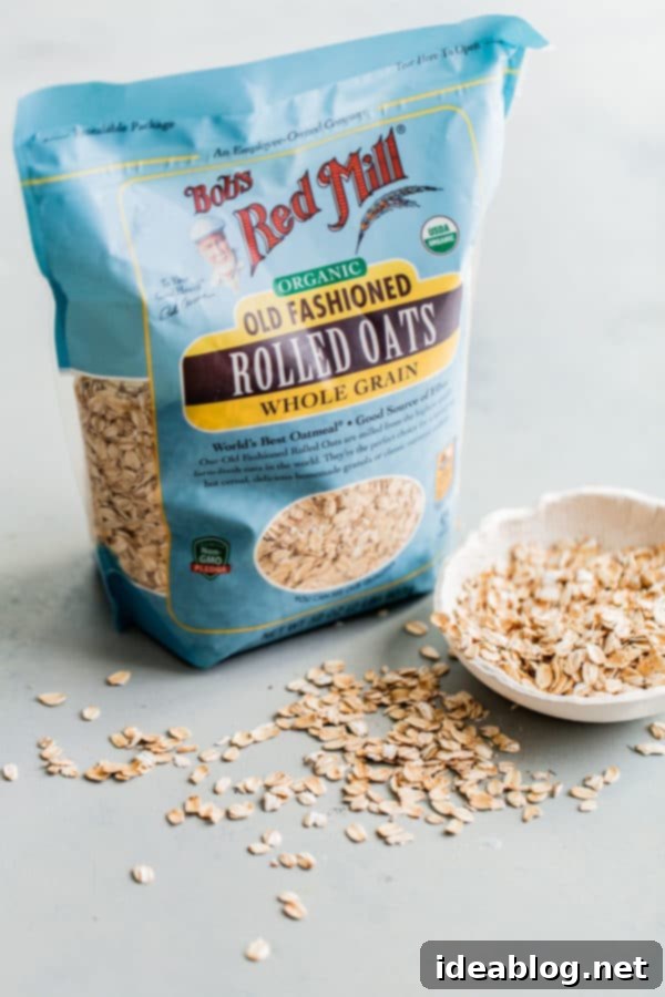 Apple Hazelnut Crisp - this DELICIOUS apple crisp recipe is the perfect mix of sweet and tart, and topped with a buttery hazelnut oat crisp topping. Bob's Red Mill Organic Old Fashioned Rolled Oats package