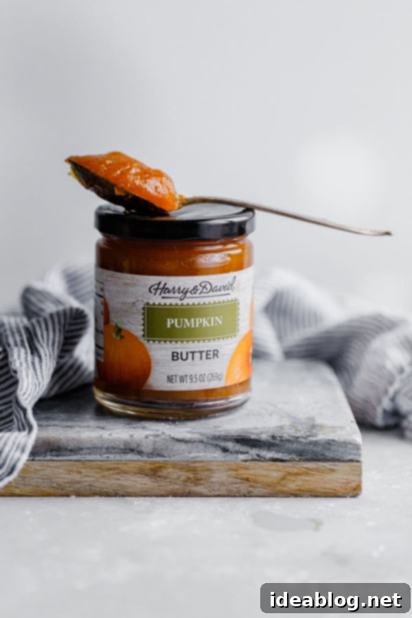 Harvest Spice Coffee Cake with Creamy Pumpkin Swirl 4 Jar of Harry & David Pumpkin Butter, showcasing its rich, smooth texture, a key ingredient for the coffee cake.