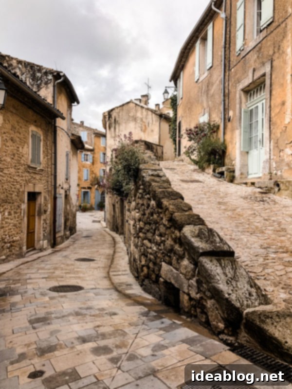 Provence France travel guide, focused on the Luberon, with recommendations on must-visit destinations, where to stay, and where to eat in the region. #travel #france #travelguide #abeautifulplate #provence Charming streets of Ménerbes, France