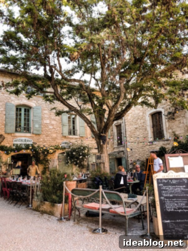 Provence France travel guide, focused on the Luberon, with recommendations on must-visit destinations, where to stay, and where to eat in the region. #travel #france #travelguide #abeautifulplate #provence Le Petit Cafe with a view of Oppède Le Vieux
