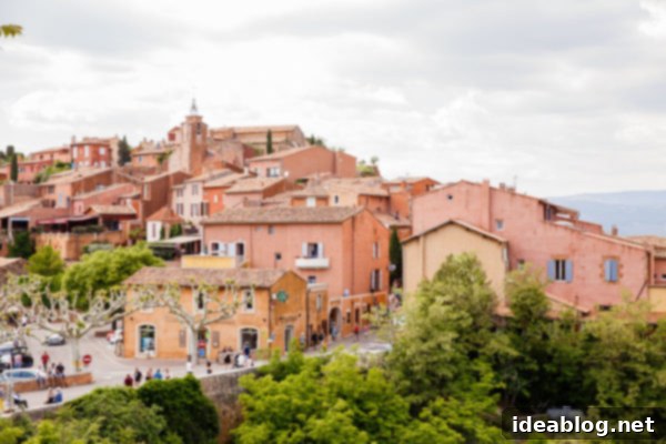 Provence France travel guide, focused on the Luberon, with recommendations on must-visit destinations, where to stay, and where to eat in the region. #travel #france #travelguide #abeautifulplate #provence Colorful buildings in Roussillon, France