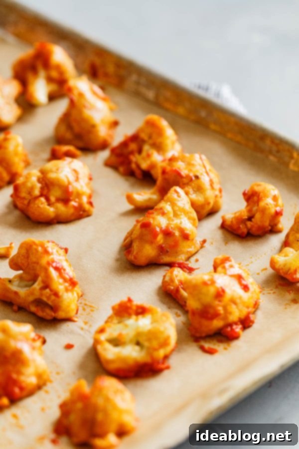 Spicy Vegan Cauliflower Wings 6 Buffalo Cauliflower on Half Sheet Pan