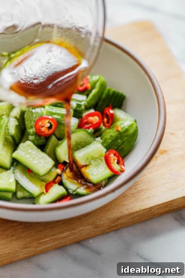 Chinese Cucumber Salad - dressing ingredients including rice vinegar, soy sauce, sesame oil, and chili peppers for a refreshing, spicy, smashed cucumber salad. #abeautifulplate #cucumber #salad #Chinese #recipe #glutenfree #vegetarian Smashed Chinese Cucumber Salad with Dressing Ingredients
