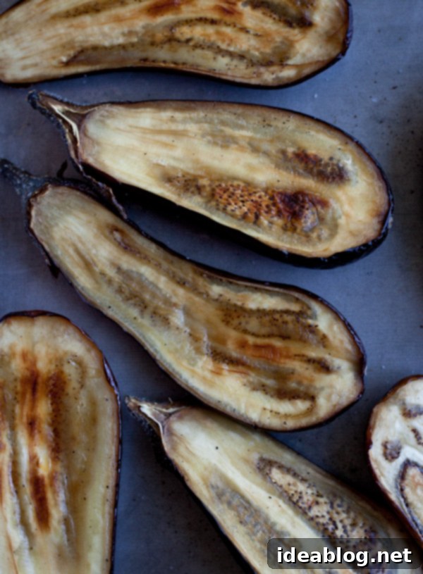 Fire-Kissed Eggplant Dip 4 Roasted Eggplant Halves ready for scooping