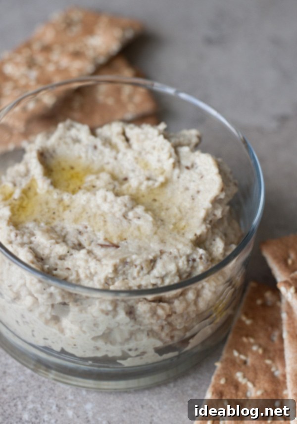 Fire-Kissed Eggplant Dip 5 Roasted Eggplant Dip served in a bowl with a spoon