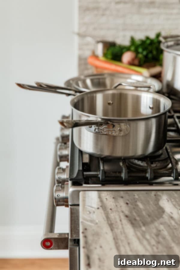 Pan Seared Salmon with Lentils - crispy pan seared salmon topped with a zesty caper herb vinaigrette and served alongside a flavorful French lentil salad. #sponsored #salmon #lentils #abeautifulplate #recipe #healthy #dinner #glutenfree #dairyfree All-Clad D5 Brushed Stainless Steel Cookware used for cooking Pan Seared Salmon with French Lentil Salad - showcases quality kitchen tools for perfect results. #AllClad #Cookware #KitchenEssentials