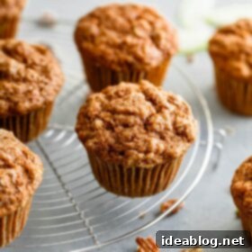 Wholesome Apple Cinnamon Muffins 8 Whole Wheat Apple Cinnamon Muffins - a close-up of a delicious muffin.