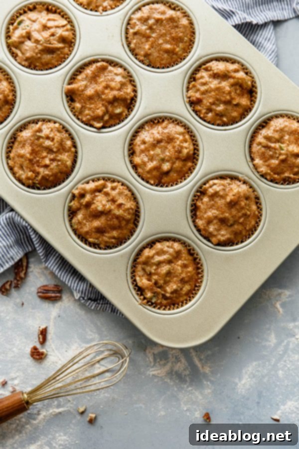 Wholesome Apple Cinnamon Muffins 5 Apple Cinnamon Muffin Batter - close-up view of the whole wheat batter with grated apples and pecans.